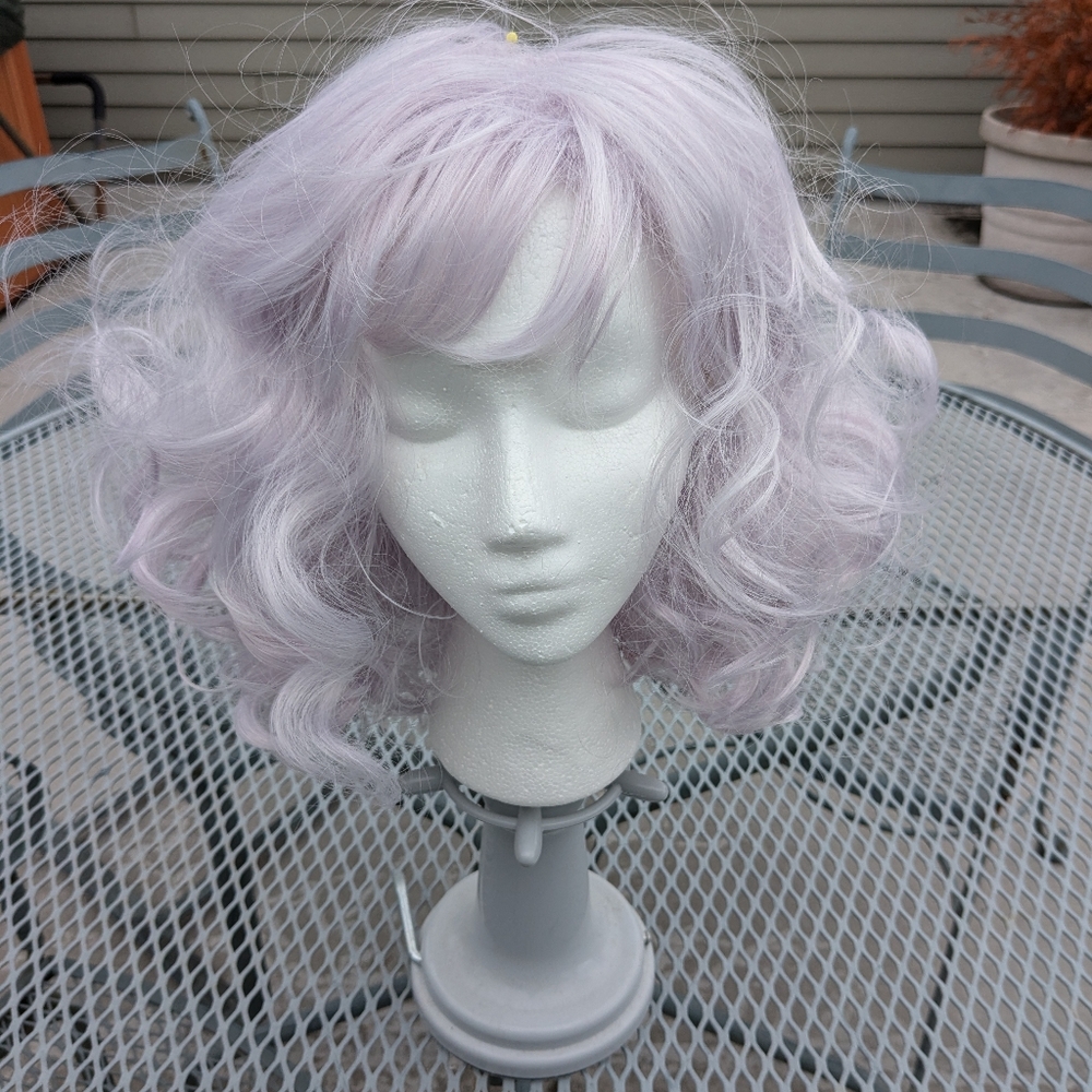 Synthetic water with lavender tinted wig